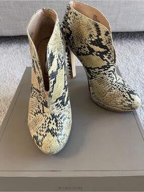 BCBG Snake-Print Stiletto Booties in Natural and Black